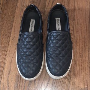 Black Steve Madden slip ons
